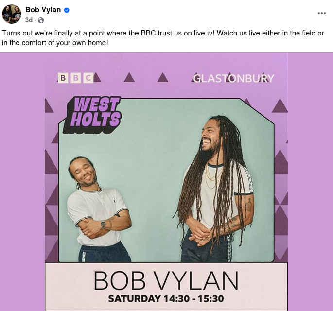 Screenshot of a social media post. It shows a promotional image for Bob Vylan's live performance at Glastonbury, showing text that it is scheduled for Saturday from 14:30 to 15:30 at West Holts. The image features two smiling members of the band against a purple background with BBC and Glastonbury logos. Text above is written by the band (with a verified check mark) and reads, “Turns out we’re finally at a point where the BBC trust us on live tv! Watch us live either in the field or in the comfort of your own home!”